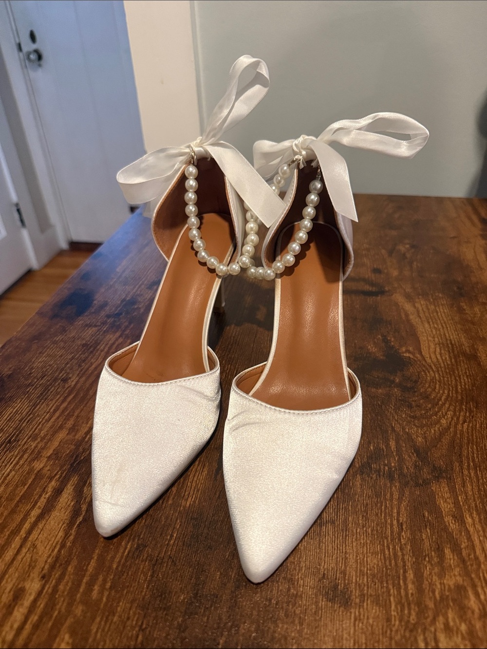 Elegant White Satin Pointed-Toe Heels with Pearl Ankle Straps